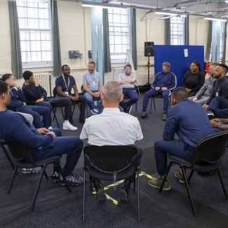 Group of prisoners and staff