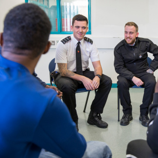 Two prison officers